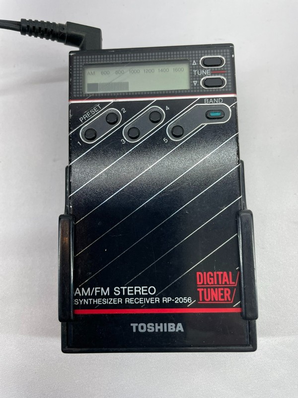 Vtg TOSHIBA AM/FM Stereo Radio RP-2056 Made in Japan w/ Belt Clip & Headphones gallery