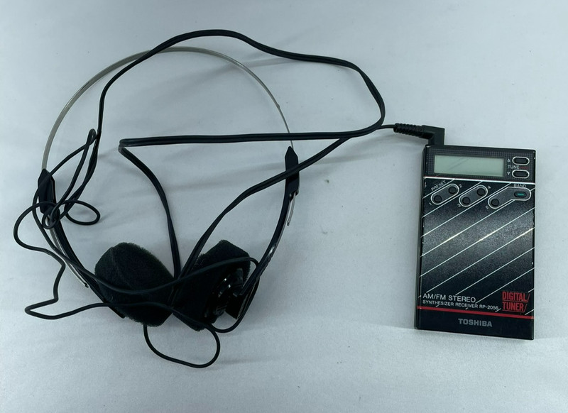 Vtg TOSHIBA AM/FM Stereo Radio RP-2056 Made in Japan w/ Belt Clip & Headphones gallery