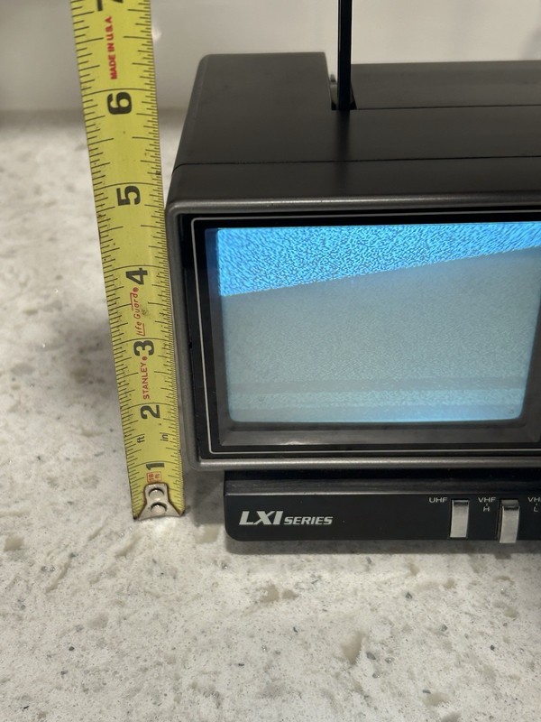 Vintage LXI Series 580.50310650 - 4 Inch TV Television Clock Radio Combo. gallery